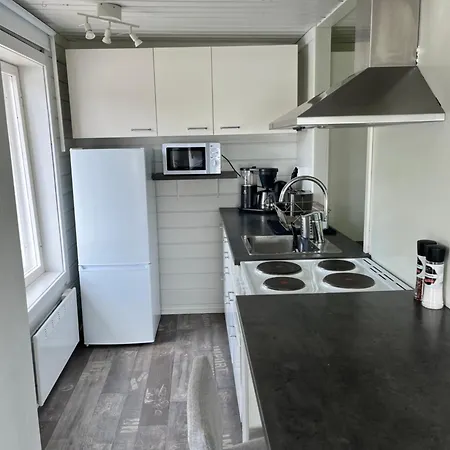 Alpesi faház Laituri Enaejaerven Rannalla *